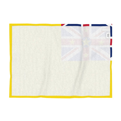 Reverse of the tea towel featuring the Niue flag.