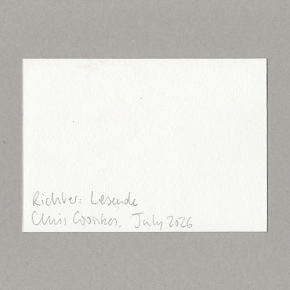 A square white textured paper card with handwritten black ink text in the bottom-left corner, placed on a smooth gray surface. The text reads 'Richter: Lesende' and 'Chris Coombes, July 2026'.