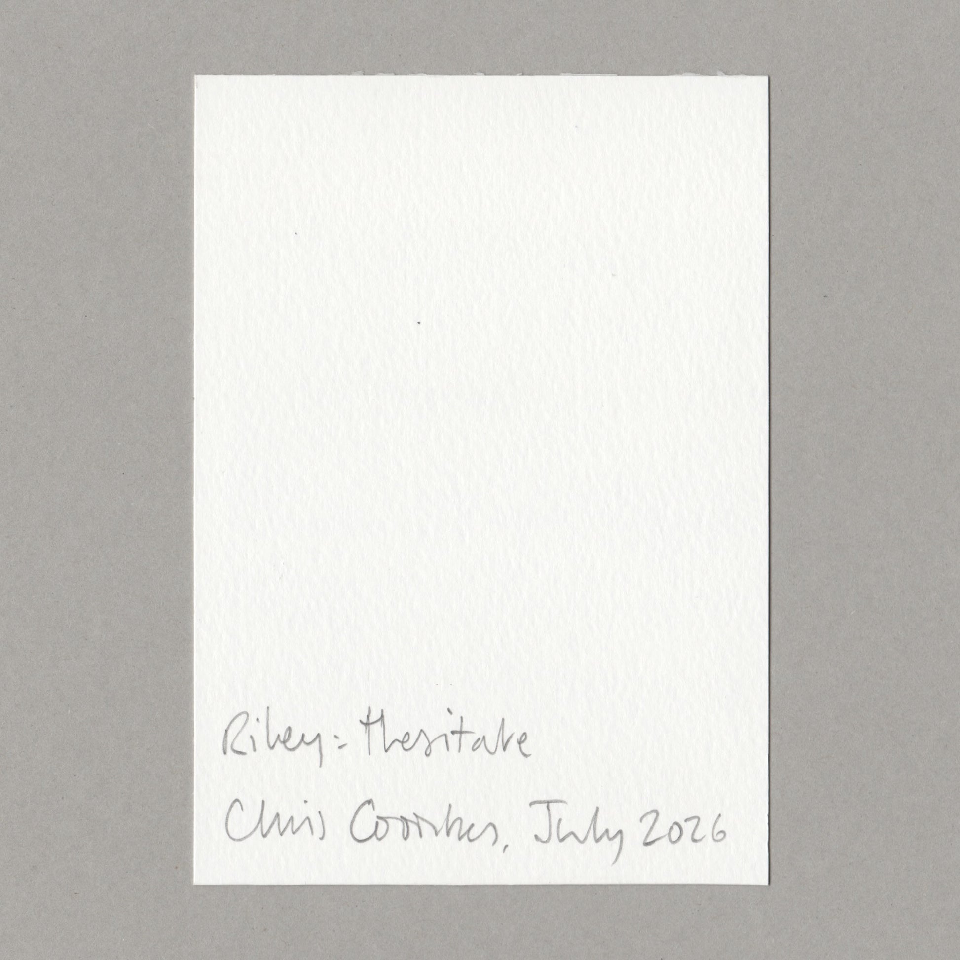 A white art card with handwritten text at the bottom, placed on a neutral gray background. The handwritten text reads 'Riley - Hesitate' and 'Chris Coombes, July 2026'.