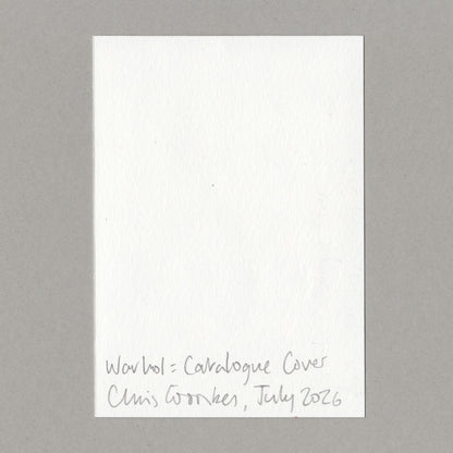 A white textured paper card with handwritten text at the bottom reading 'Warhol  Catalogue Cover Chris Coombes July 2026', centered on a neutral gray background.